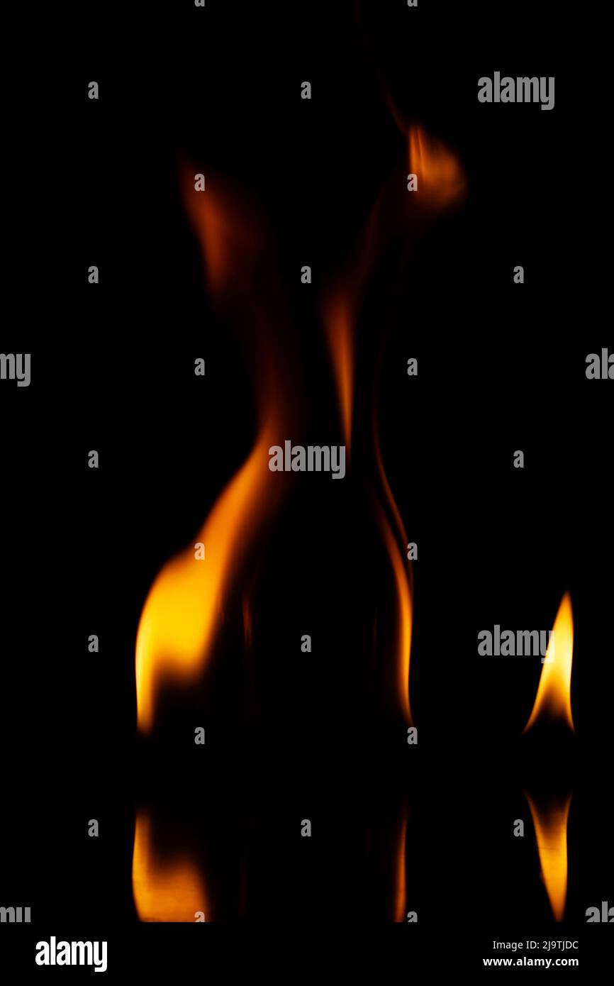 Fire flames isolated on a black background Stock Photo - Alamy