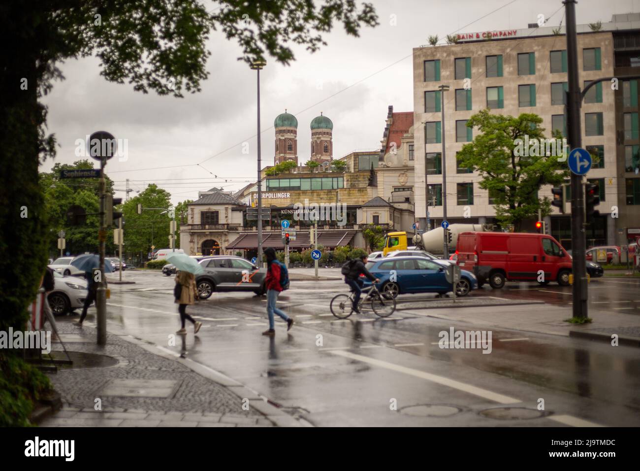 View on Oberpollinger and Her Lady's Dome. On May 25, 2022 there were  rainfalls in Munich, Germany. People wore rain kackets and umbrellas.  (Photo by Alexander Pohl/Sipa USA Stock Photo - Alamy