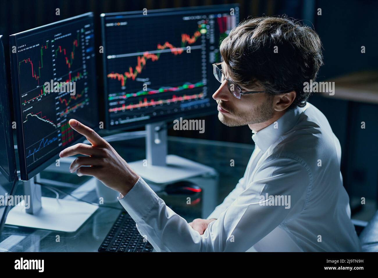 financial analyst working on modern computers . close-up. Stock Photo