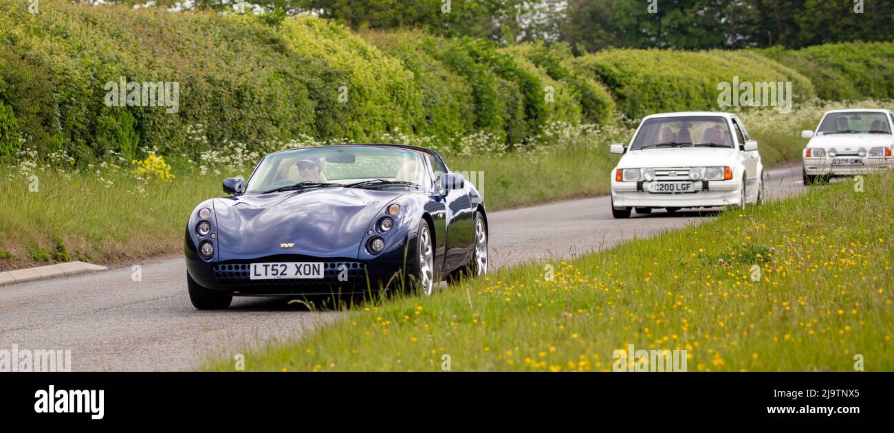 2002 TVR Tuscan leads a line of classic cars Stock Photo