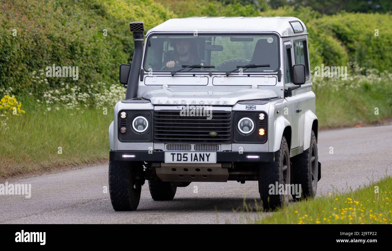 2004 silver Land Rover Defender Stock Photo Alamy