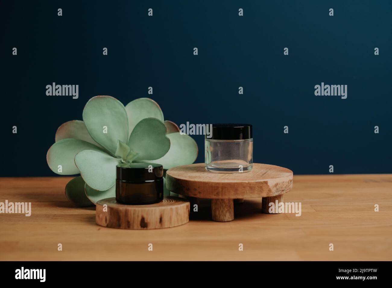 Wooden desk and wooden stage for a cosmetics products Stock Photo