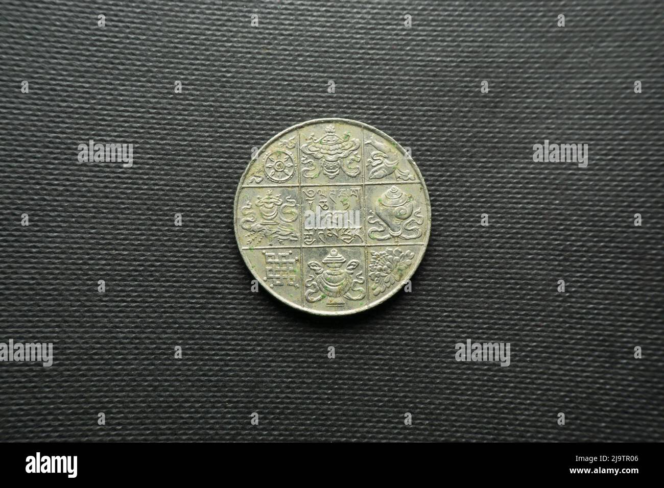 1/2 Rupee coin dated 1928, Bhutan, Back view, Silver Stock Photo