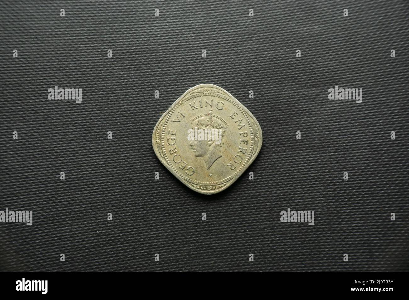 2 Anna Indian coin dated 1947 India, Back view, King Copper