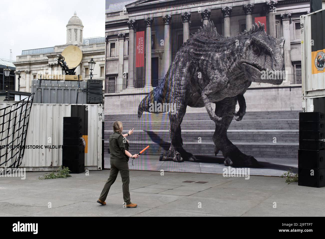 25th May, 2022. London, UK, Jurassic World life size virtual reality dinosaur meets people on Trafalgar Square. The film comes to cinemas on June 10 2022. Tyrannosaurus rex (rex meaning 'king' in Latin), often called T. rex or colloquially T-Rex. Credit: JOHNNY ARMSTEAD/Alamy Live News Stock Photo