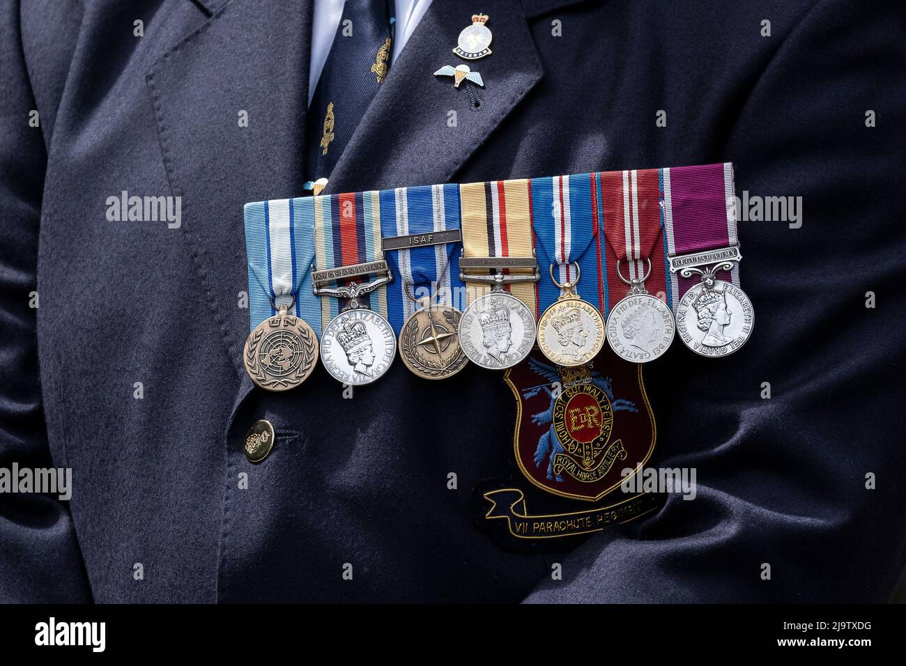 Medals proudly worn on the chest of a veteran serviceman attending the drum head service to rededicate the memorials to the Allied Airborne Forces and Stock Photo