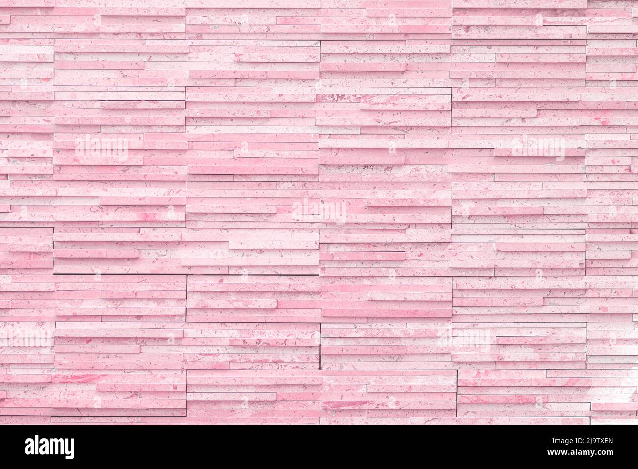 background masonry walls narrow long brick tiles modern, pink bright acid light red cherry. Stock Photo