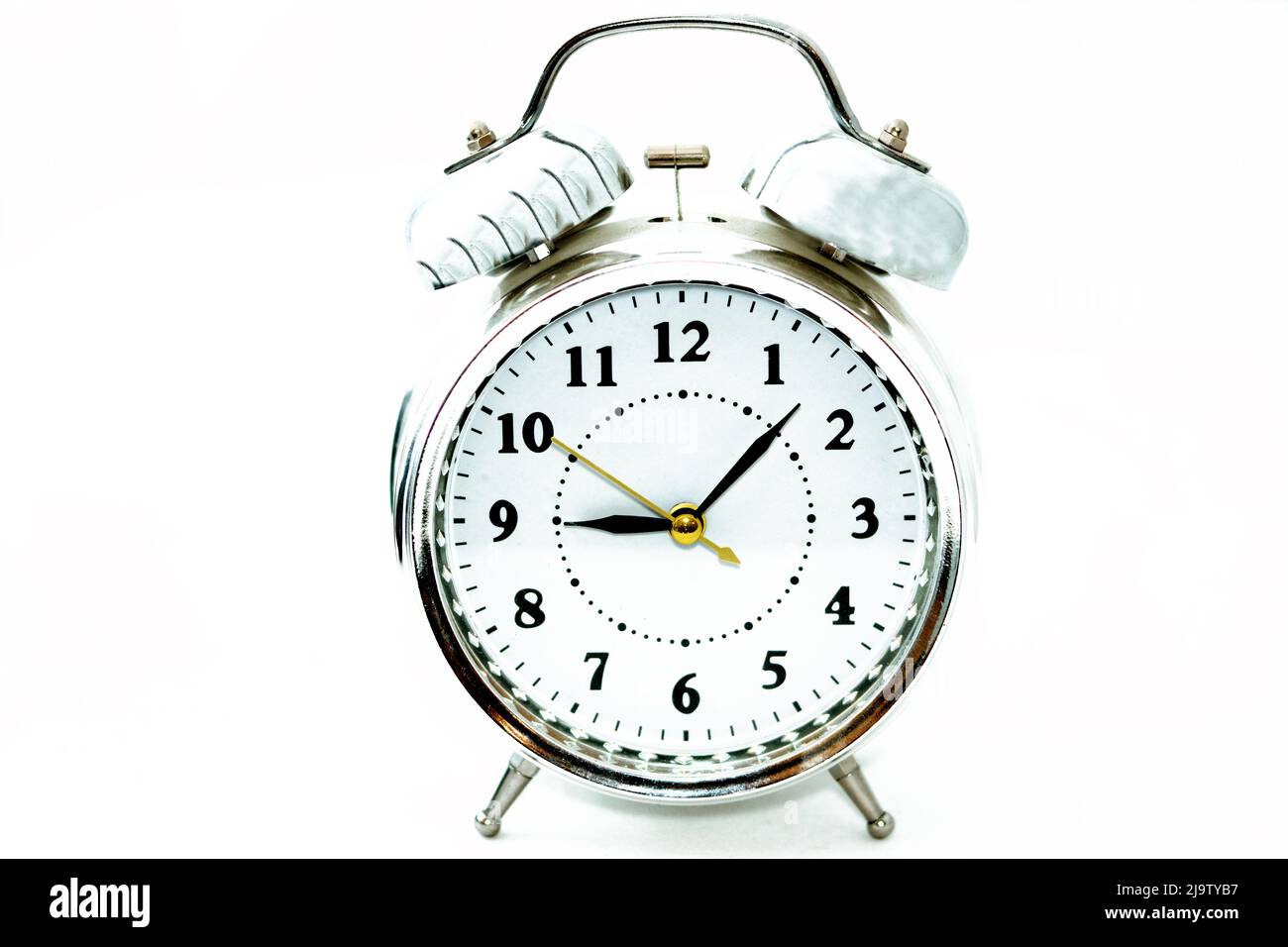 Sliver alarm clock isolated on white background, a vintage retro old