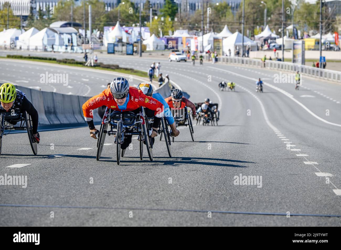 Kazan, Russia - May 17, 2022: group disabled athlete in wheelchair during Kazan Marathon Stock Photo