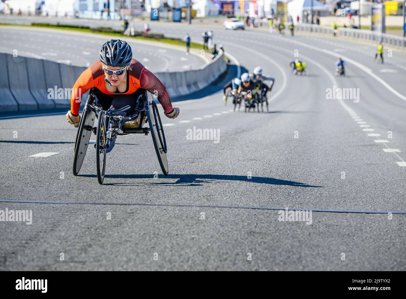 Kazan, Russia - May 17, 2022: female disabled athlete in wheelchair during Kazan Marathon Stock Photo