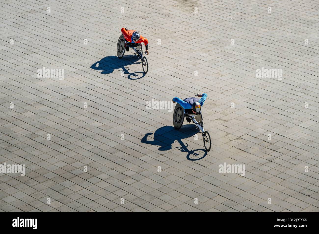 Kazan, Russia - May 17, 2022: two disabled athlete in wheelchair during Kazan Marathon Stock Photo