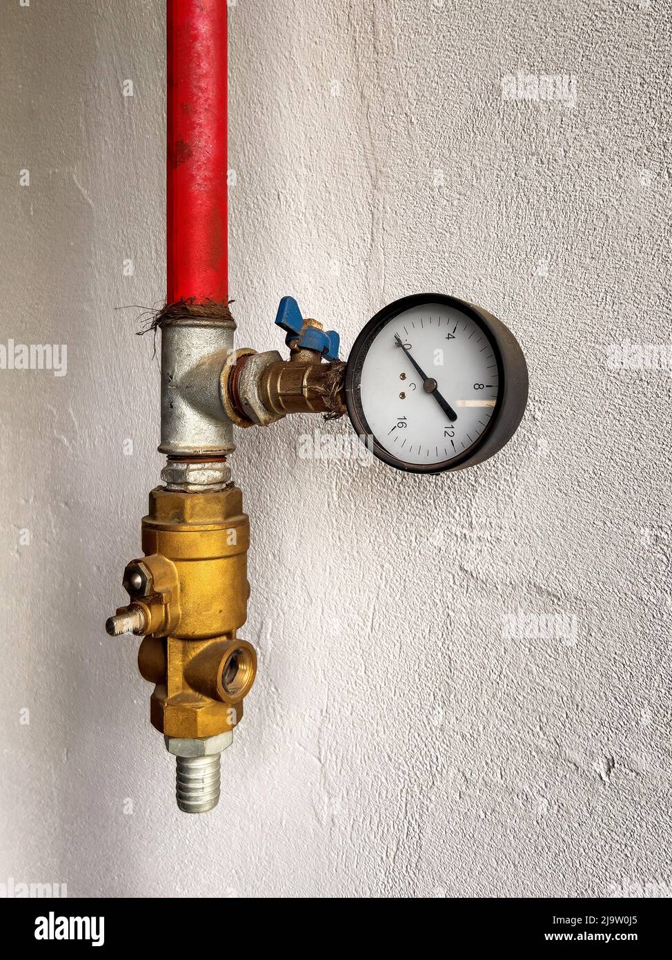 Gas manometer on the wall, industrial equipment Stock Photo
