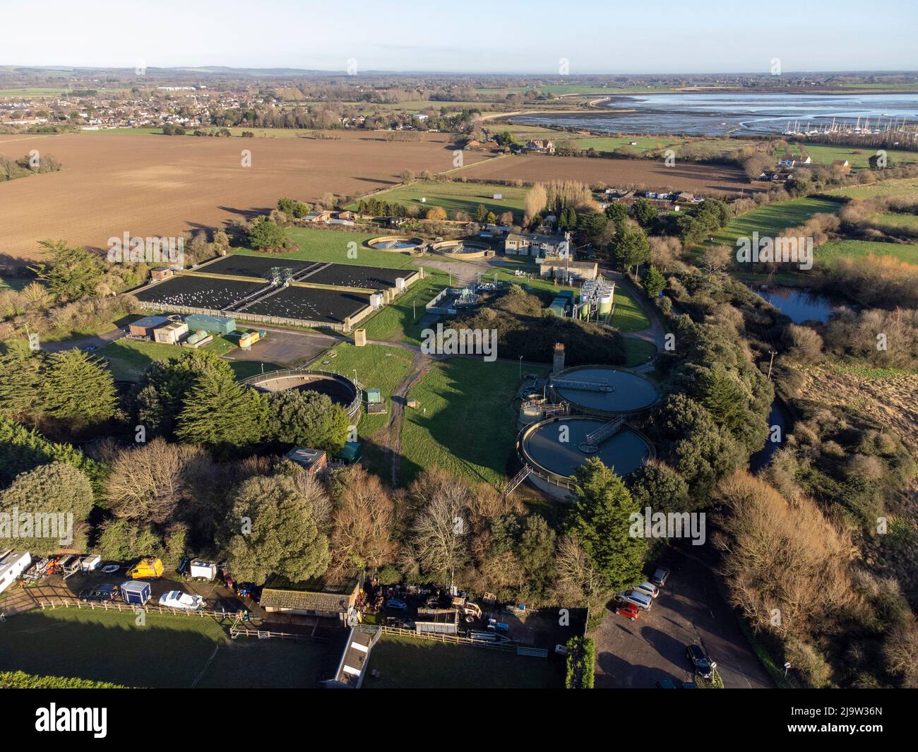 Aerial view of Southern Water Thornham wastewater treatment plant near Chichester Harbour, West Sussex,England Stock Photo