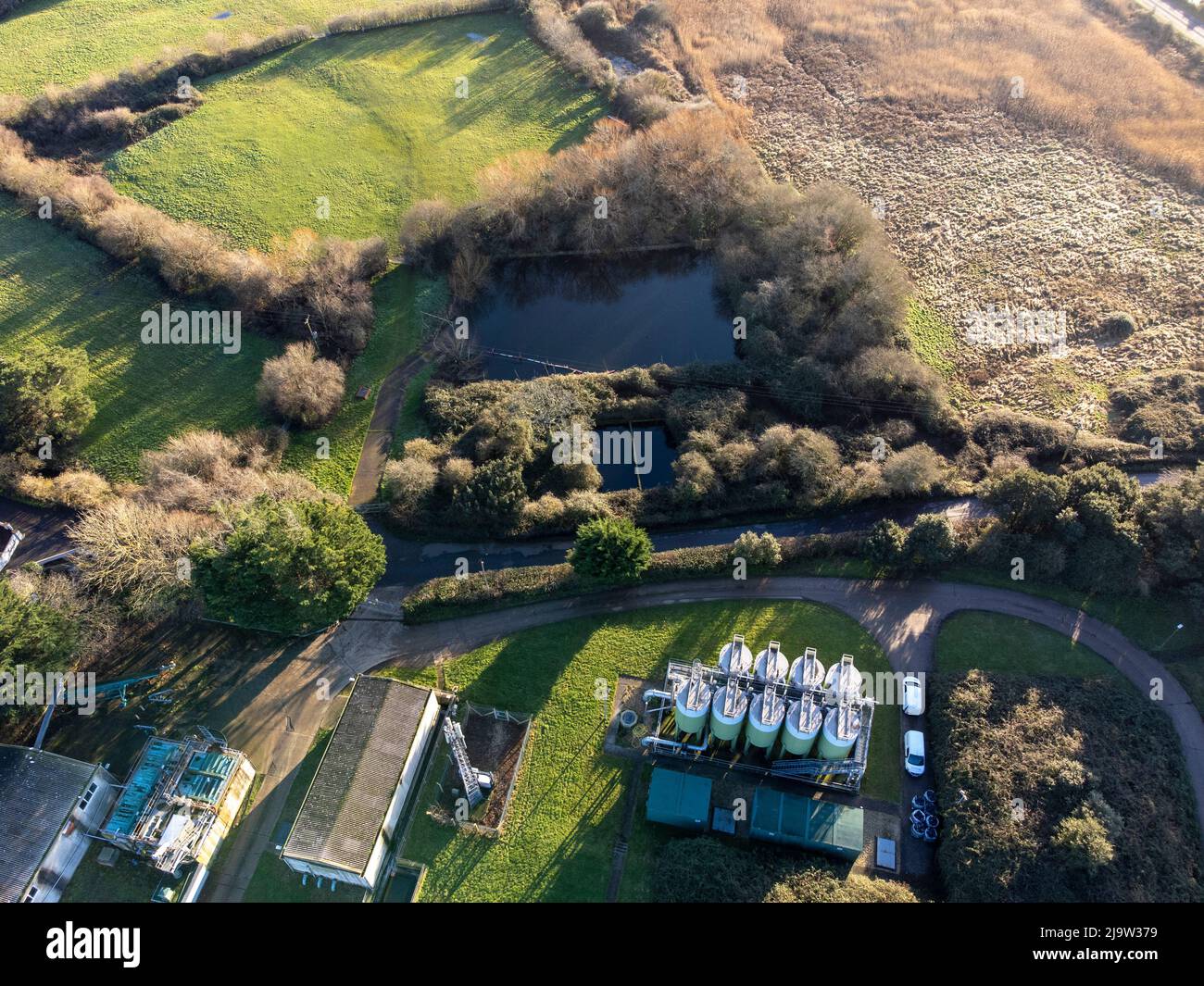 Aerial view of Southern Water Thornham wastewater treatment plant near Chichester Harbour, West Sussex,England Stock Photo