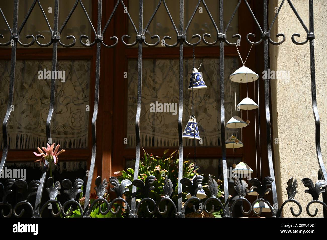 Old traditional rural house wooden window with handmade cutwork ...