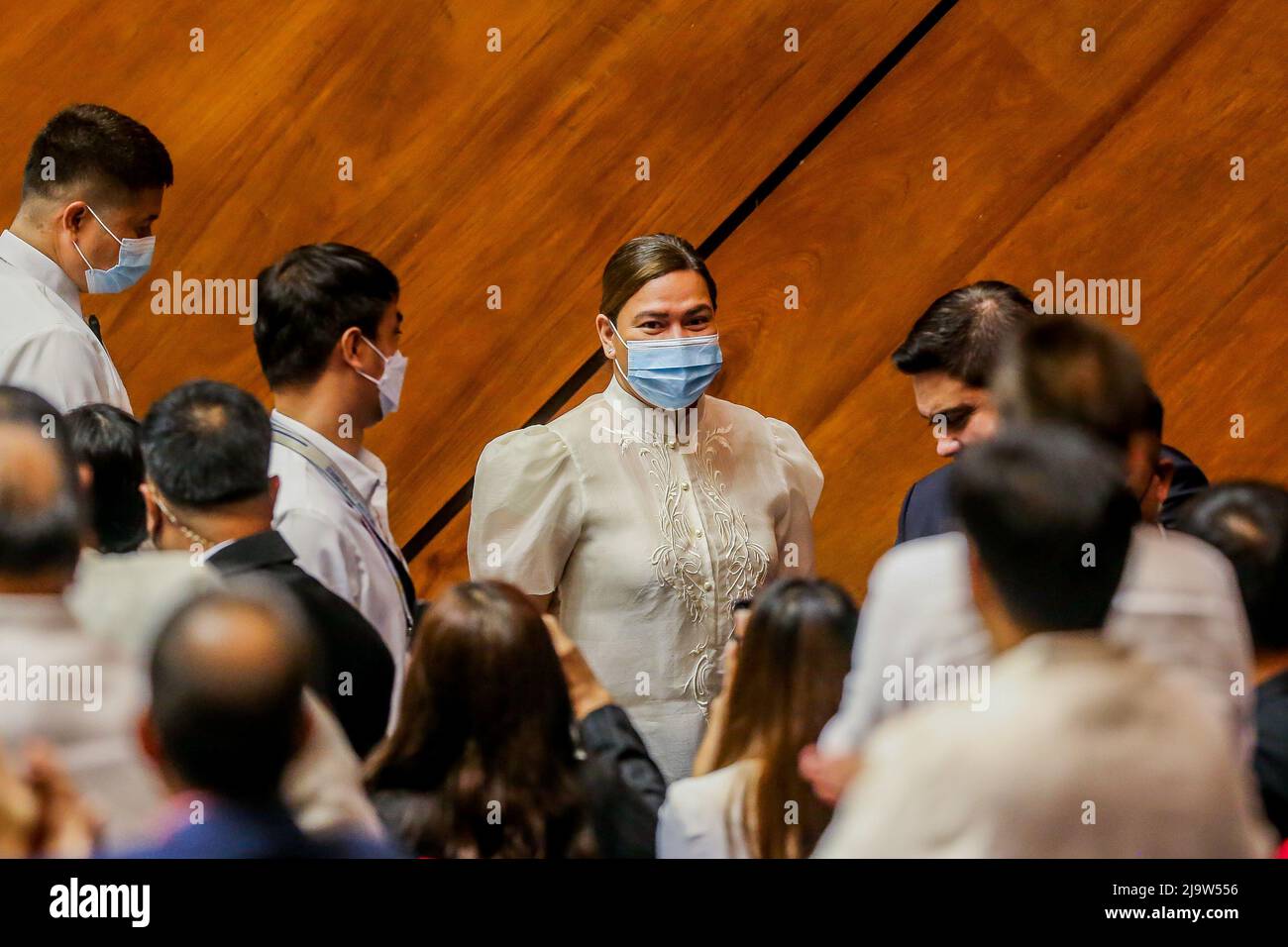 (220525) -- QUEZON CITY, May 25, 2022 (Xinhua) -- Vice President-elect Sara Duterte-Carpio (C) is seen during her proclamation at the Philippine House of Representatives in Quezon City, the Philippines, on May 25, 2022. The Philippine Congress on Wednesday proclaimed Ferdinand Romualdez Marcos as the winner of the presidential election, succeeding Rodrigo Duterte, who will step down in June after six years in office. The joint session of the Congress also proclaimed Sara Duterte-Carpio, the 43-year-old daughter of Duterte and Marcos' running mate, as the winner of the vice-presidential race Stock Photo