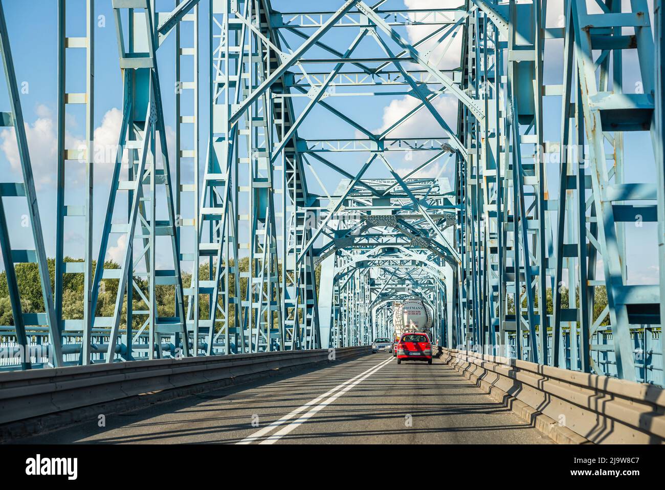 Nowy Dwor Mazowiecki, Poland - August 13, 2021. Blue bridge over Vistula river - Pilsudskiego Bridge Stock Photo