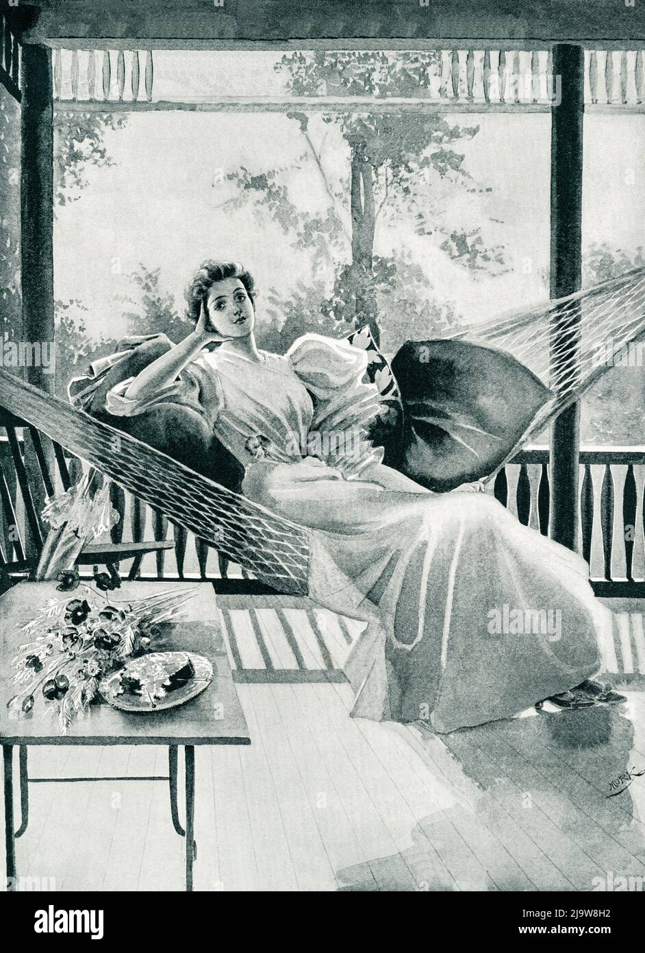 An illustration of a woman relaxing in a porch on a hamper by Frances Benjamin Johnston (1864-1952) from the August 1895 cover of Jenness Miller Monthly, August 1895. Stock Photo