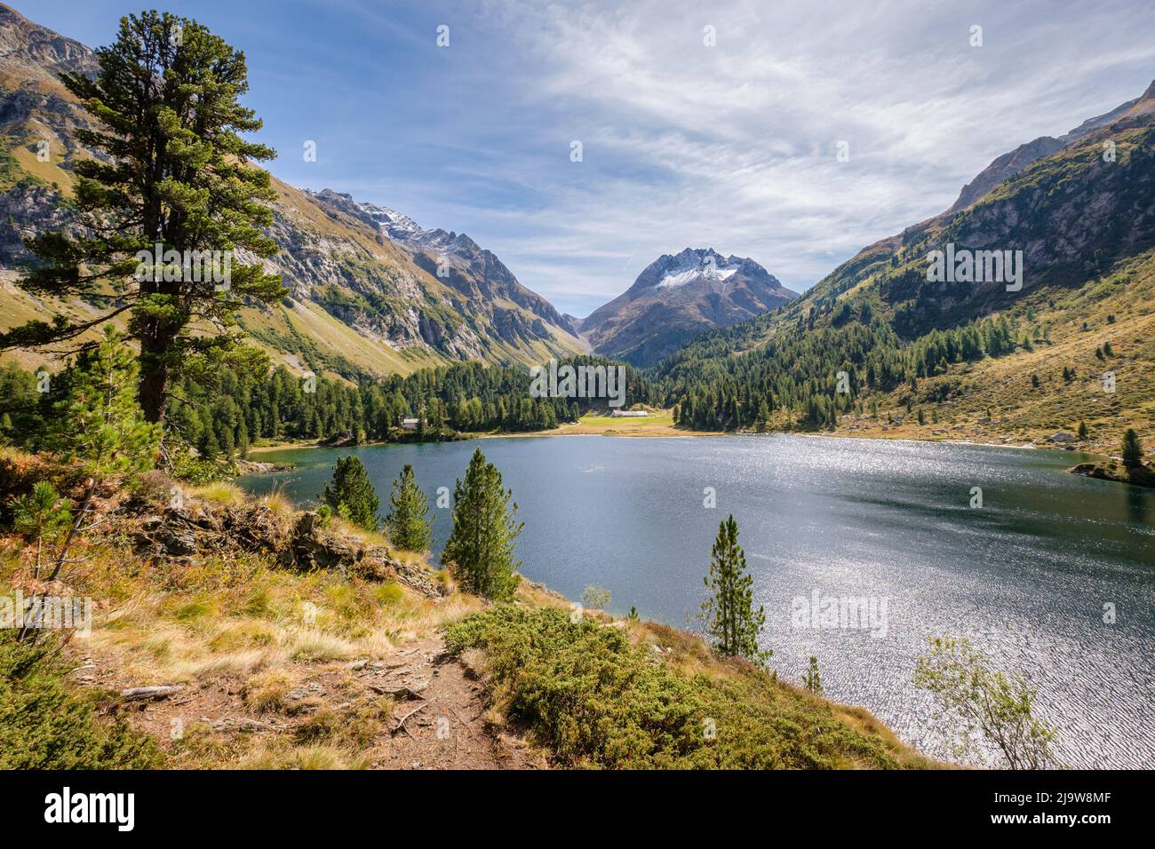 Lake Cavloc (Lägh da Cavloc) in September. It is a  lake near Maloja Pass in the Val Forno (Grisons, Switzerland) and a hour walk from Maloja. Stock Photo