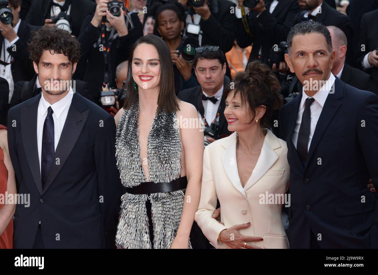 May 24, 2022, CANNES, France: CANNES, FRANCE - MAY 24: (L-R)  Director Louis Garrel, NoÃ©mie Merlant, Anouk Grinberg and Roschdy Zem attend of the film ''L'Innoncent'' (The Innocent) attend the 75th Anniversary celebration screening of ''The Innocent (L'Innocent)'' during the 75th annual Cannes film festival at Palais des Festivals on May 24, 2022 in Cannes, France. (Credit Image: © Frederick Injimbert/ZUMA Press Wire) Stock Photo