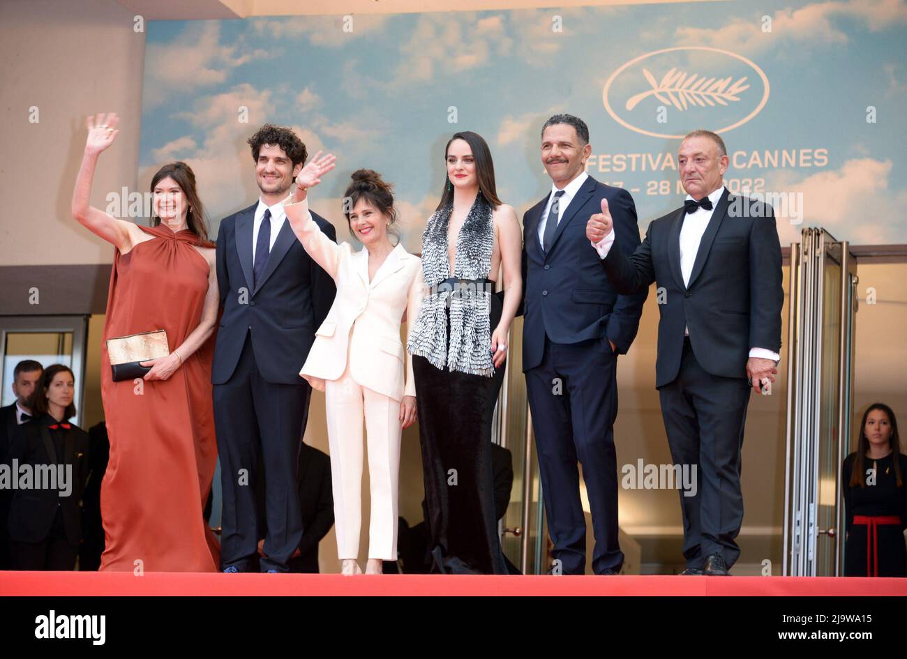 May 24, 2022, CANNES, France: CANNES, FRANCE - MAY 24: (L-R) Producer Anne-Dominique Toussaint, Anouk Grinberg, Director Louis Garrel, Roschdy Zem, NoÃ©mie Merlant and Writer Jean-Claude Pautot attend of the film ''L'Innoncent'' (The Innocent) attend the 75th Anniversary celebration screening of ''The Innocent (L'Innocent)'' during the 75th annual Cannes film festival at Palais des Festivals on May 24, 2022 in Cannes, France. (Credit Image: © Frederick Injimbert/ZUMA Press Wire) Stock Photo