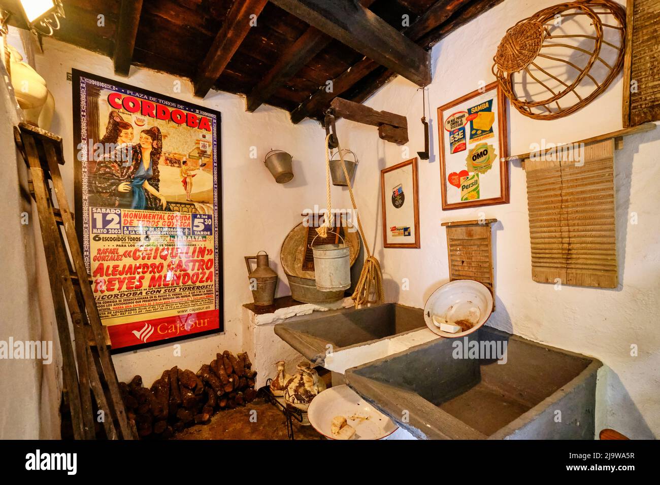 Laundry room in a traditional Patio of Cordoba, a courtyard full of flowers and freshness. San Basilio, Andalucia, Spain Stock Photo