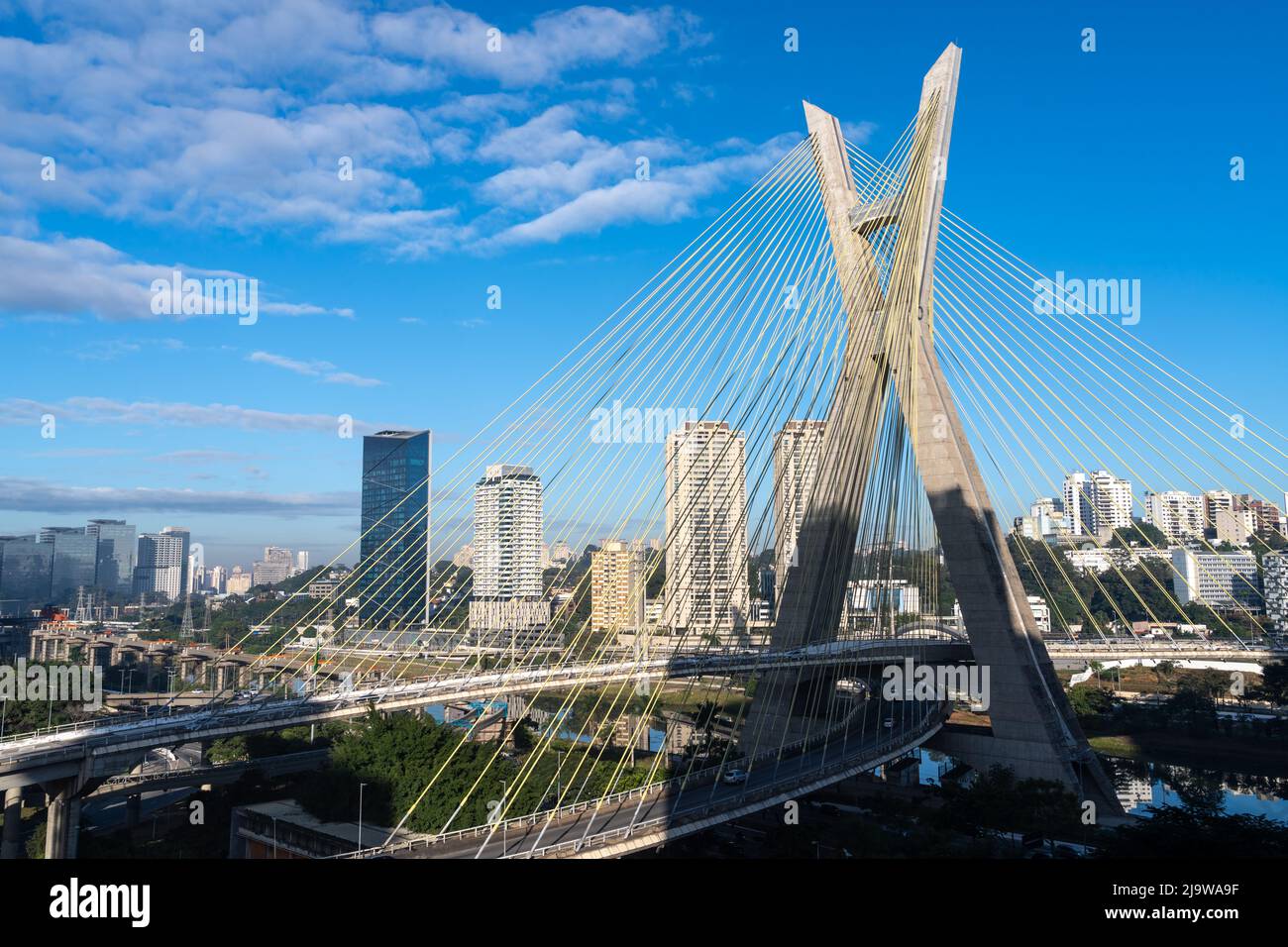 Aerial view of Sao Paulo city skyline, marginal Pinheiros avenue, modern Cable stayed bridge, Pinheiros River and corporate buildings, Brazil. Stock Photo