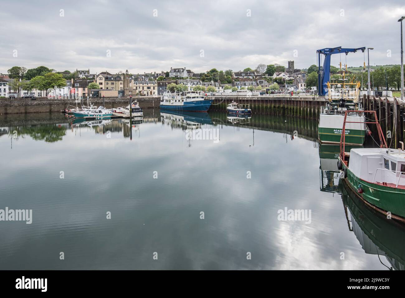 Mainly small leisure boats, moored on pontoons, in Stranraer harbour  & close to what was the former ferry port for ferries  to Northern Ireland. Stock Photo