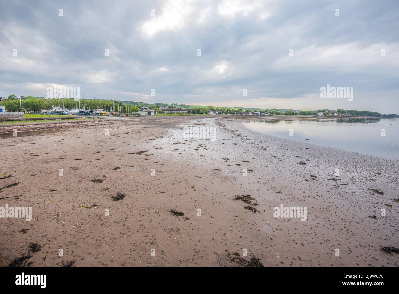Looking left along the shore from the pier at Stranraer harbour, Dumfries & Galloway Stock Photo
