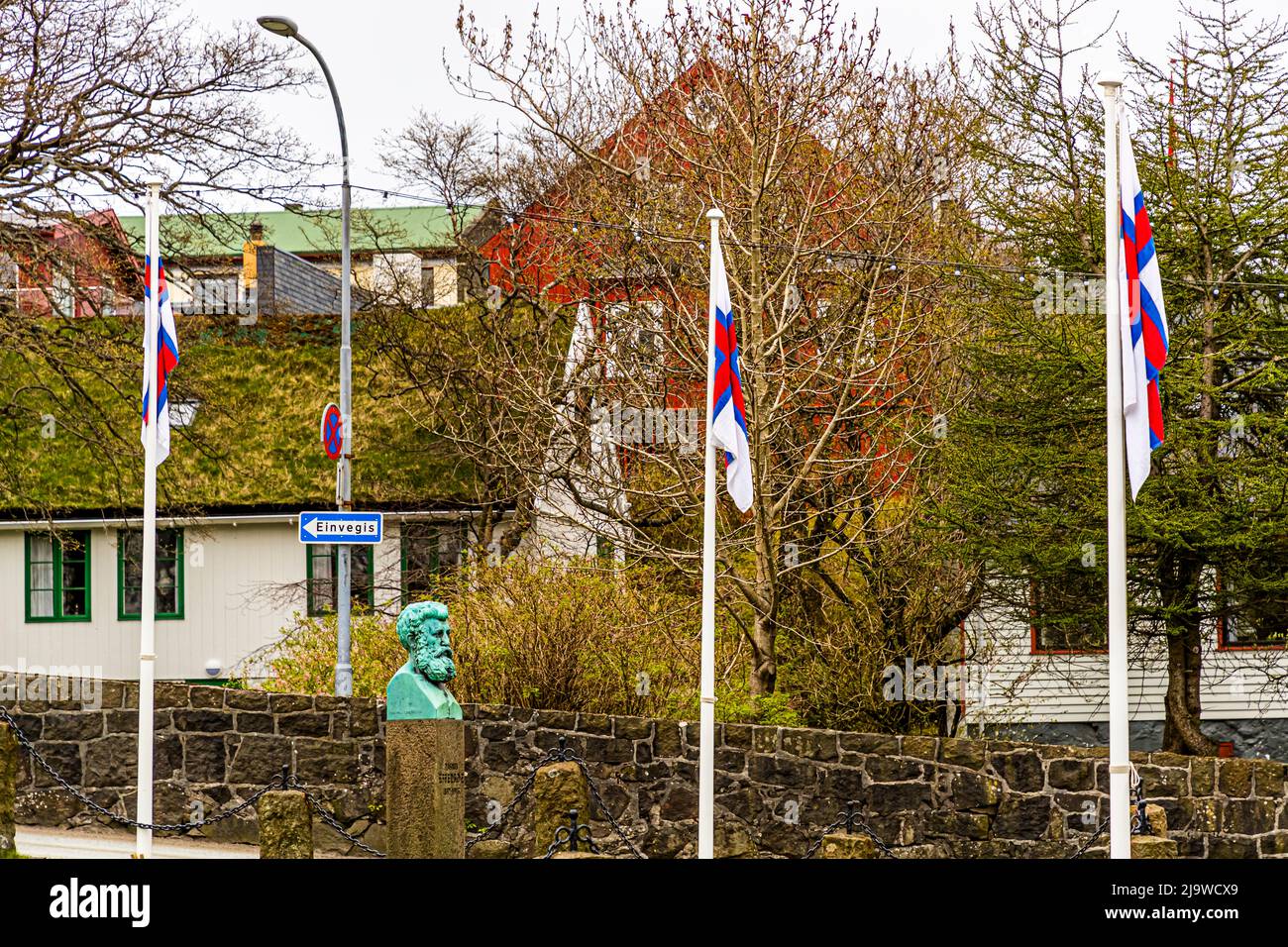 Flag of Faroe Islands at calm in Tórshavn Stock Photo