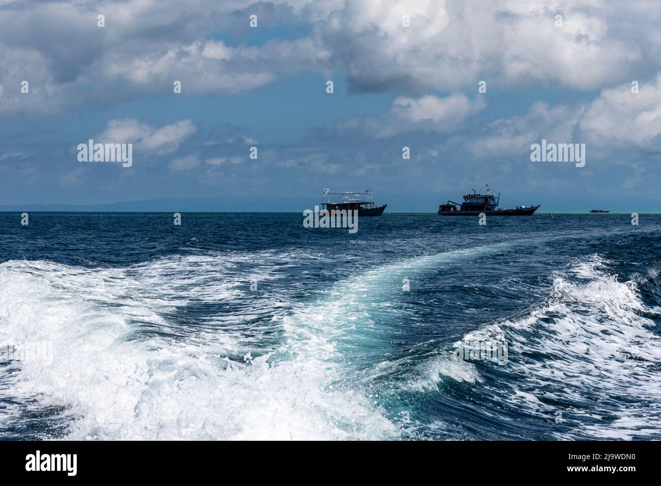 Boat wake in tropical ocean Semporna Sabah Malaysia Stock Photo