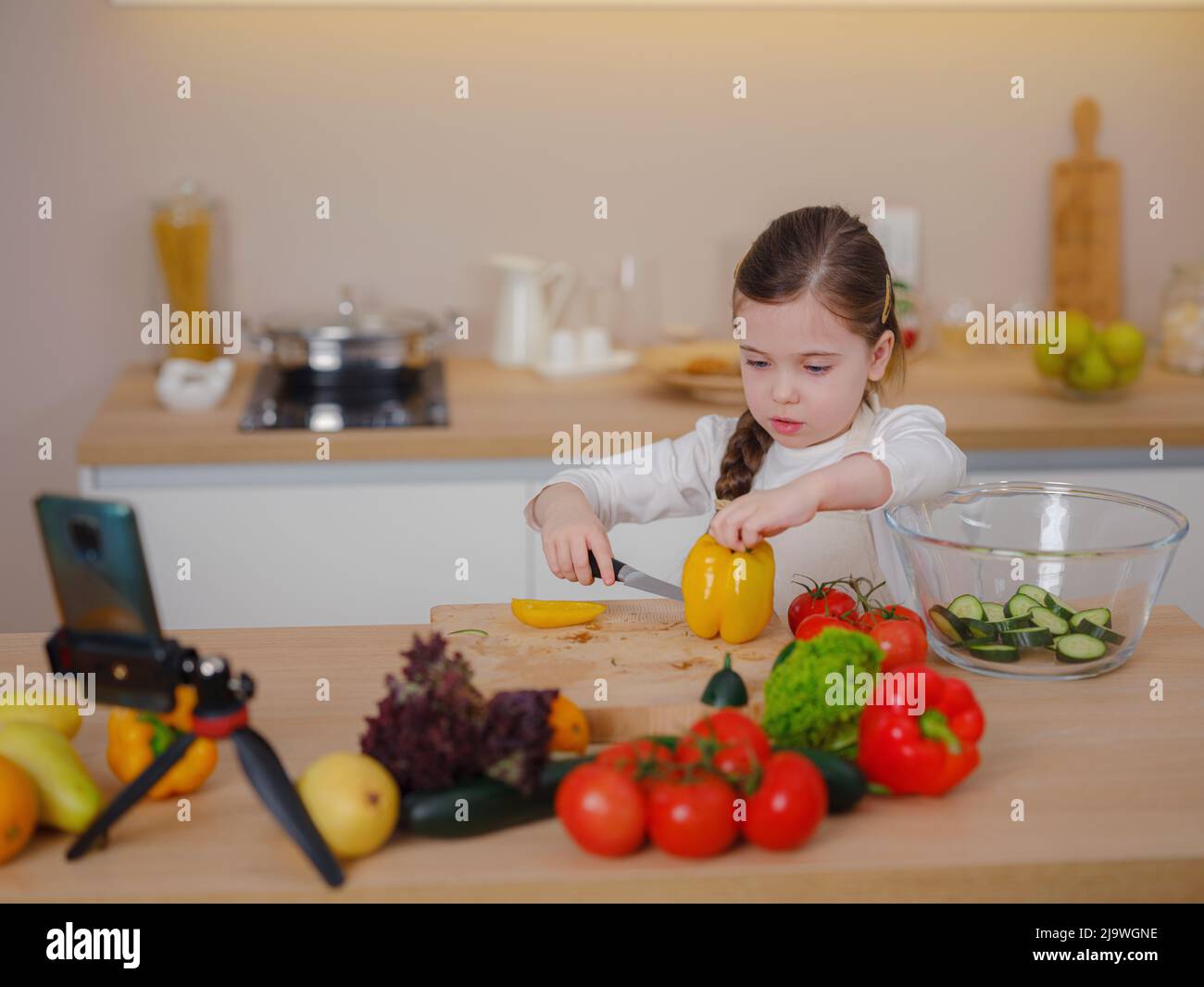 Young Girl Vlogger Making Social Media Video About Cooking At Home