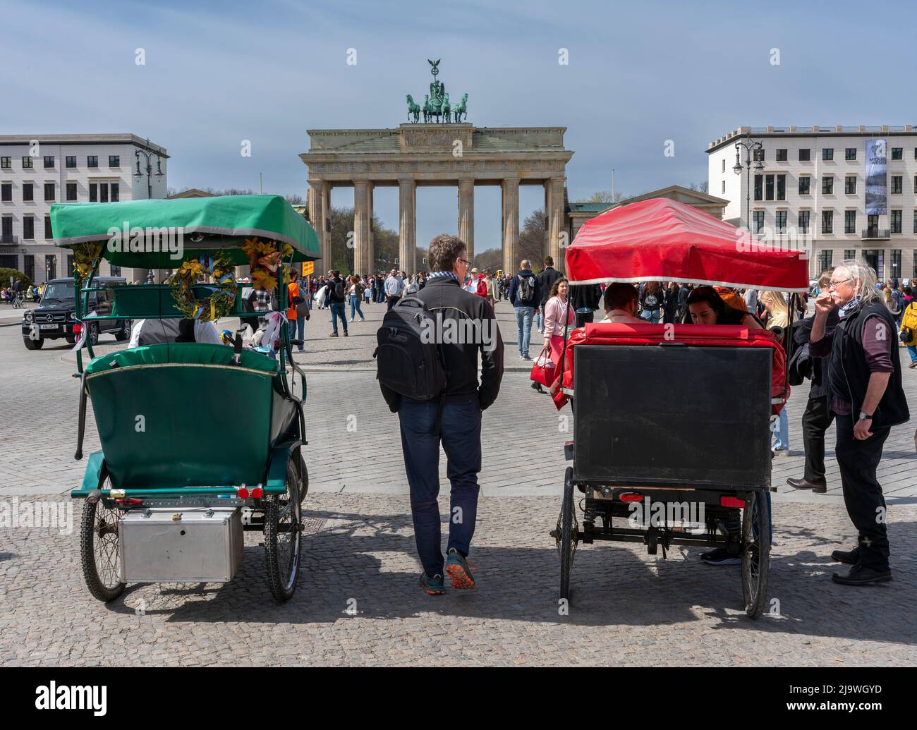 Tourists In Front Of The Brandenburg Gate, Berlin, Germany Stock Photo