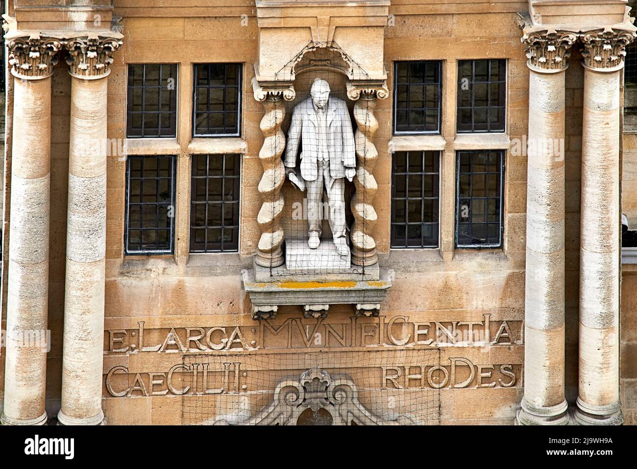 ORIEL COLLEGE OXFORD ENGLAND STATUE OF CECIL RHODES ON THE FACADE OF