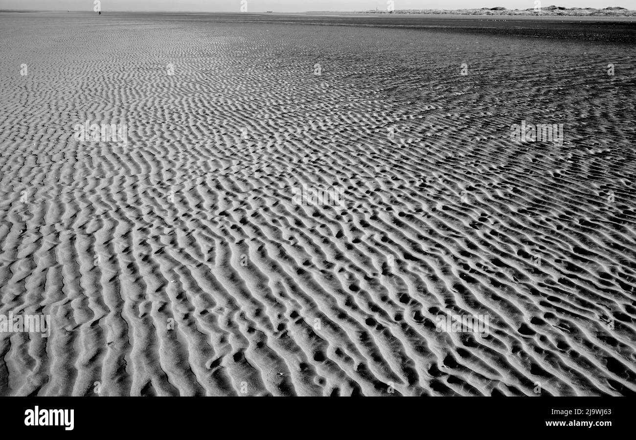 Black and white shot of beach texture and ripples Stock Photo