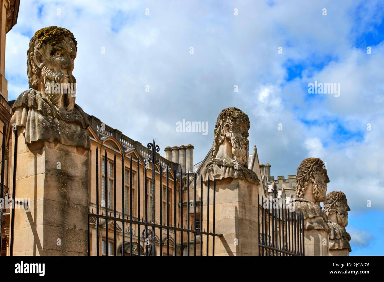 OXFORD ENGLAND BROAD STREET OUTSIDE THE SHELDONIAN FOUR CARVED BUSTS OF THE HERMS OR EMPERORS Stock Photo