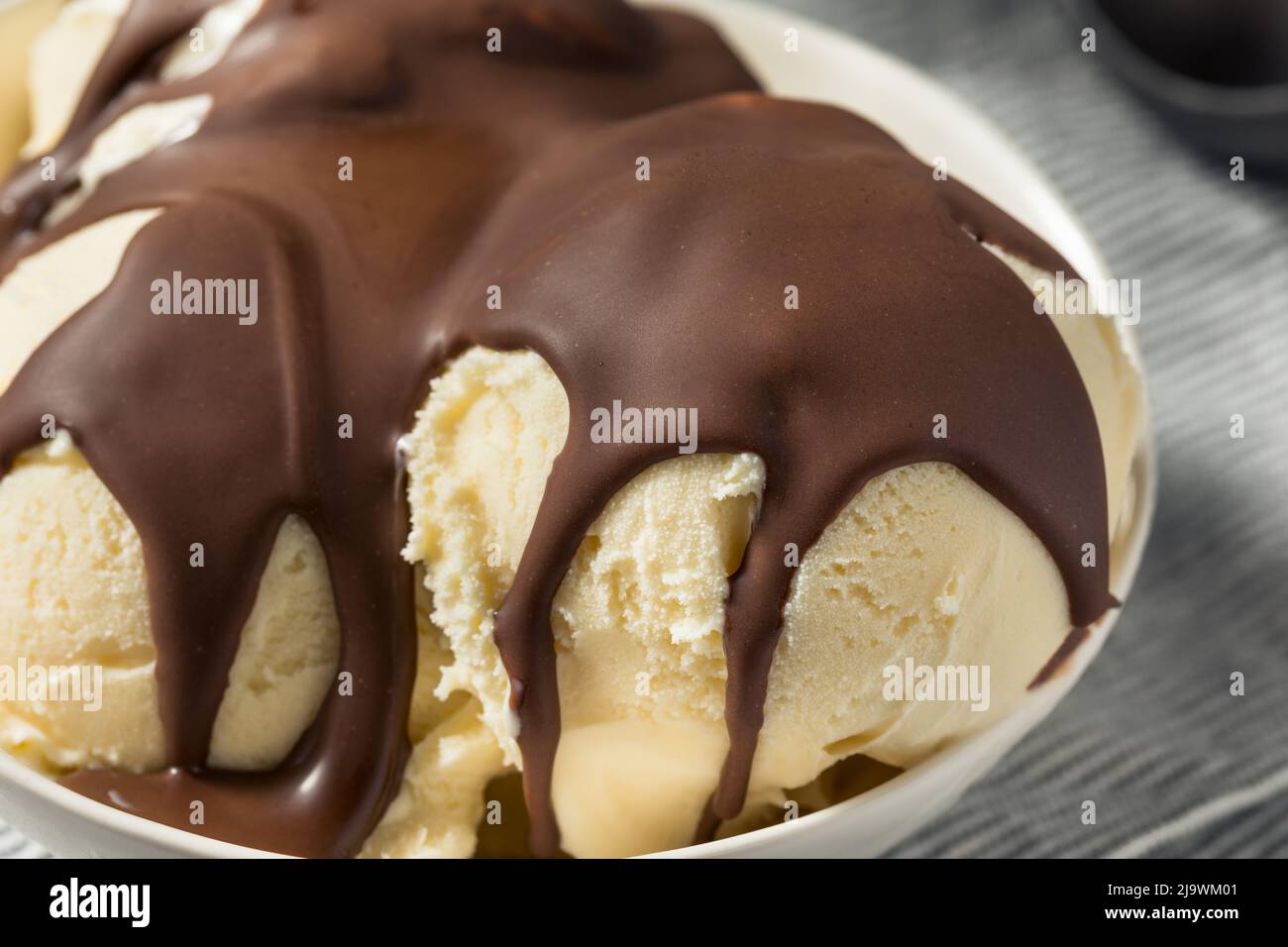 Sweet Hard Chocolate Shell Ice Cream Sundae in a Bowl Stock Photo Alamy