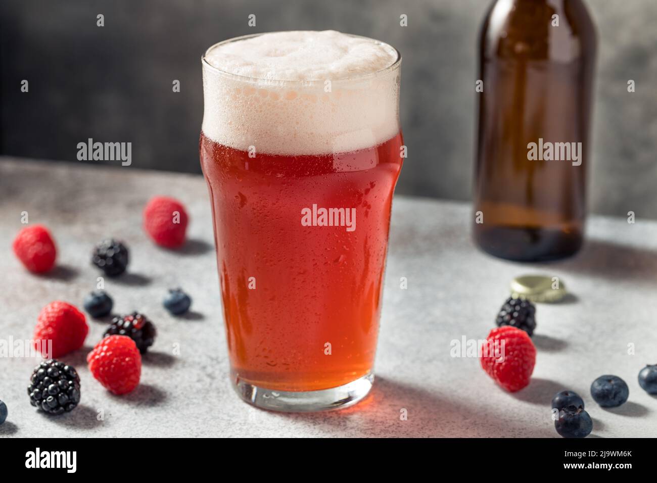 Cold Refreshing Berry Beer Shandy in a Pint Glass Stock Photo