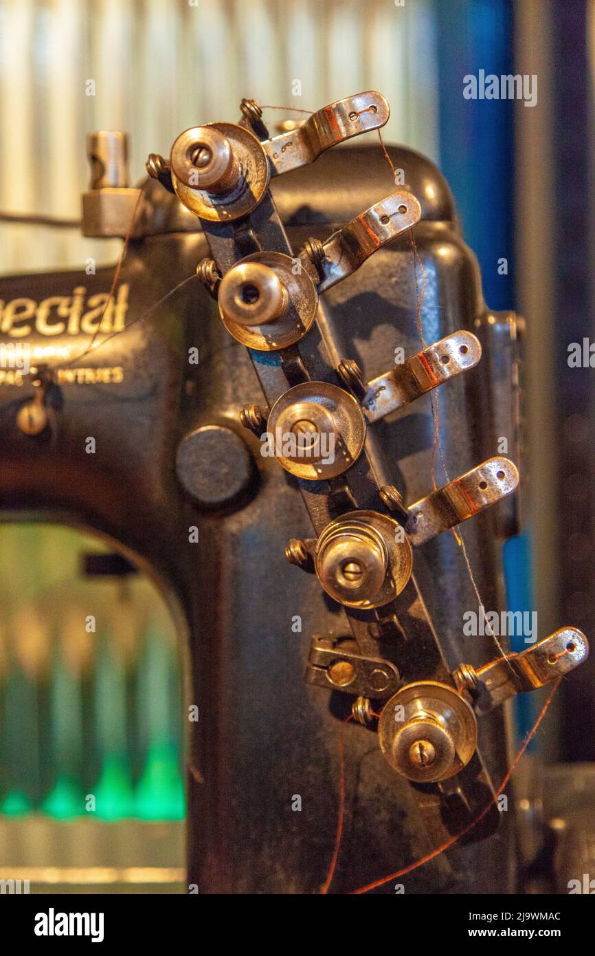 old professional industrial sewing machine with multiple bobbins Stock Photo Alamy