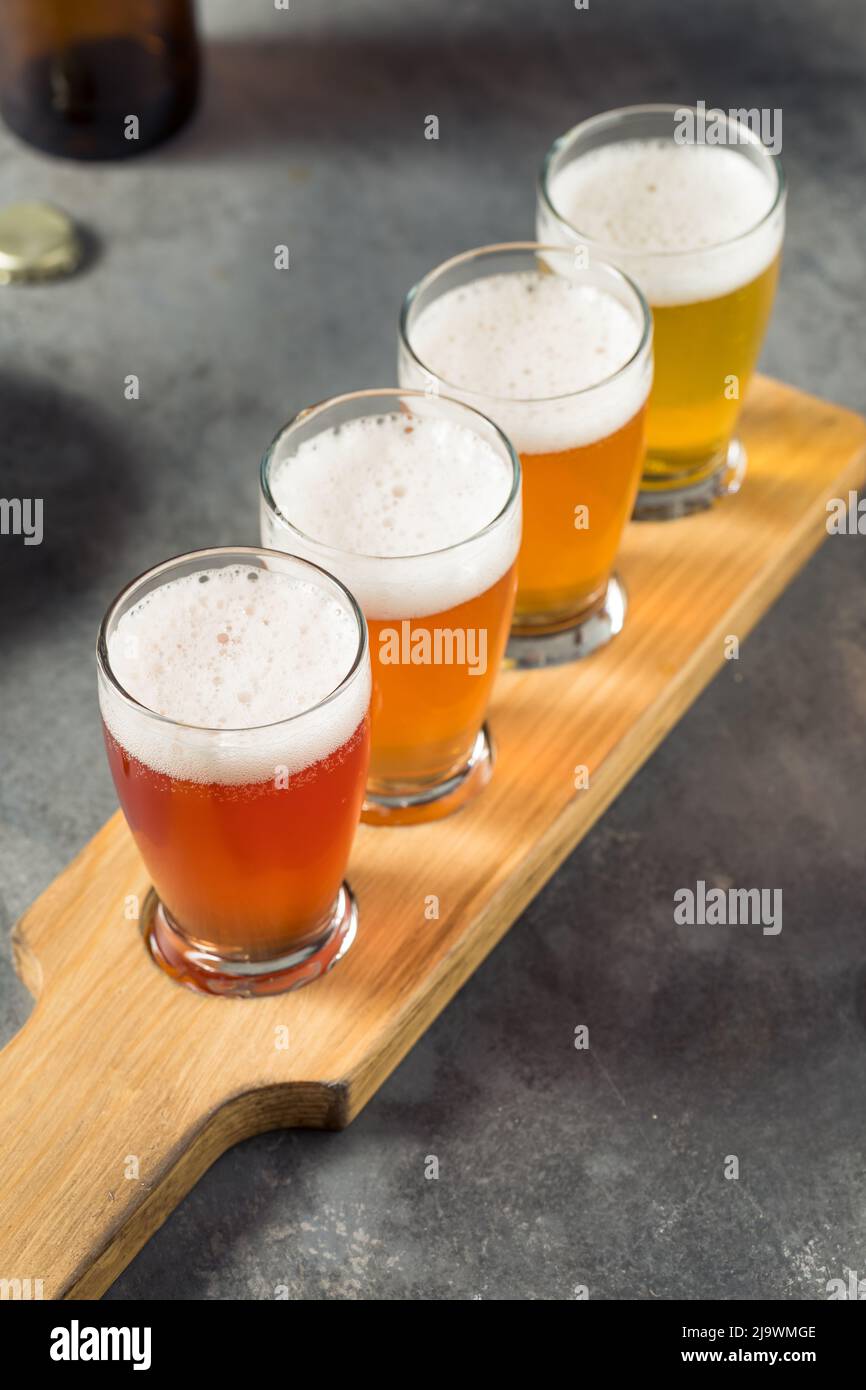 Cold Refreshing Sour Beer Flight with Cocktail Nuts Stock Photo