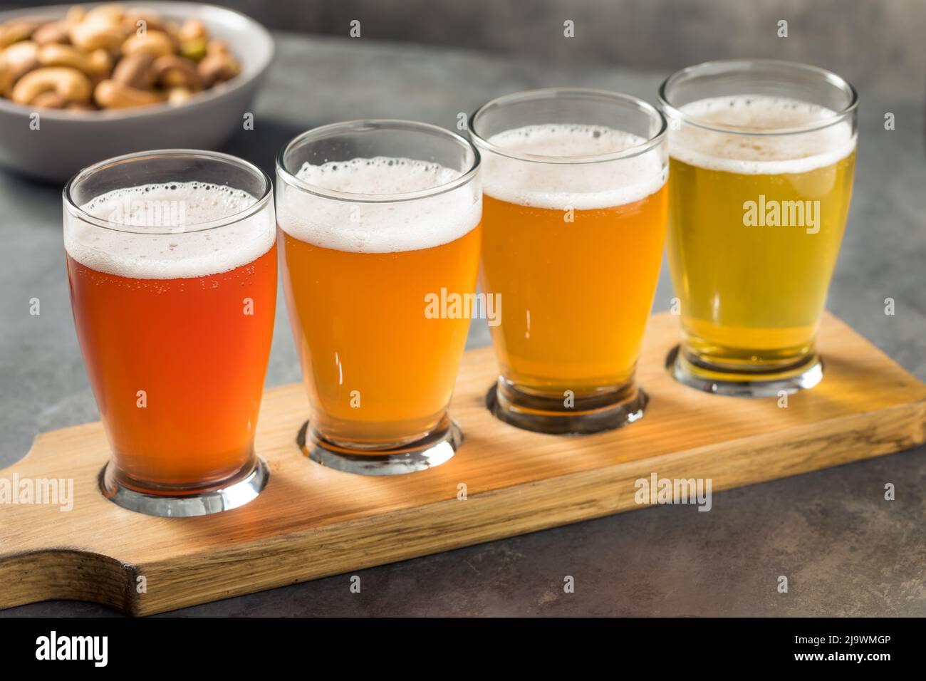 Cold Refreshing Sour Beer Flight with Cocktail Nuts Stock Photo Alamy