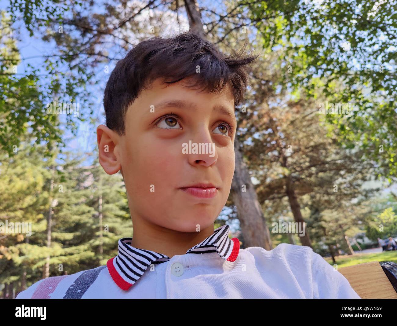 various facial expressions of a boy Stock Photo Alamy