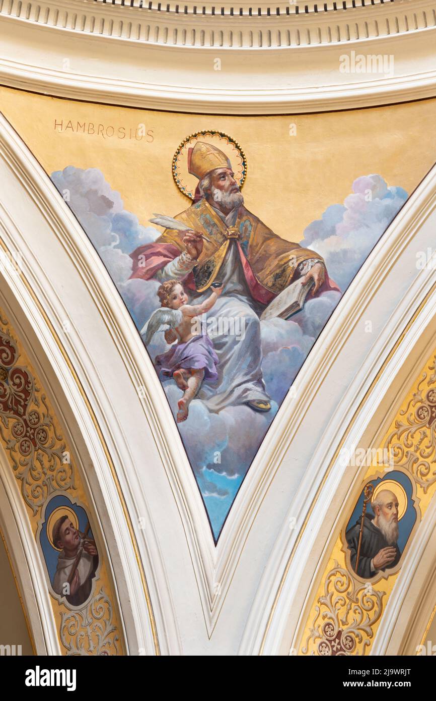 BARI, ITALY - MARCH 3, 2022: The fresco of Ambrose doctor of the church in the church Chiesa San Ferdinando by Nicola Colonna (1862 -1948). Stock Photo