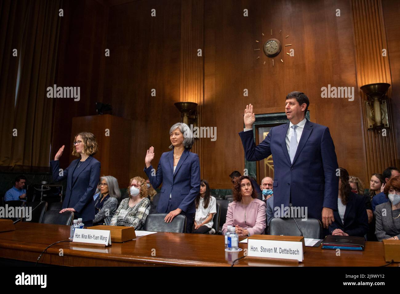 Tiffany M. Cartwright, left, Nina Nin-Yuen Wang, center, and Steven M. Dettelbach, right, are sworn-in during their Senate Committee on the Judiciary nominations hearing in the Dirksen Senate Office Building in Washington, DC, Wednesday, May 25, 2022. Credit: Rod Lamkey/CNP /MediaPunch Stock Photo