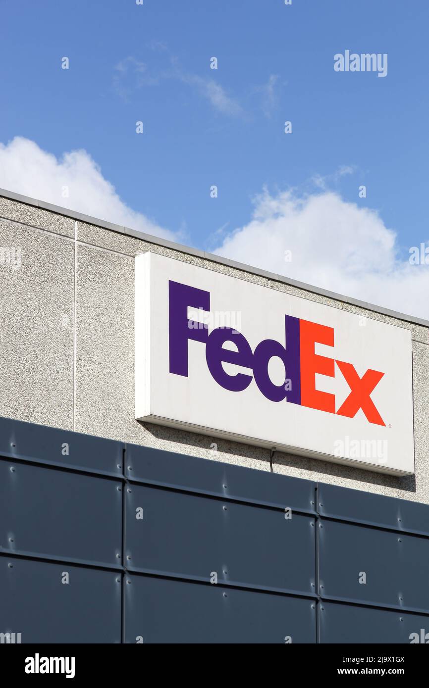 Kolding, Denmark - February 28, 2016: FedEx sign on a wall. FedEx Corporation is an American global courier delivery services company Stock Photo