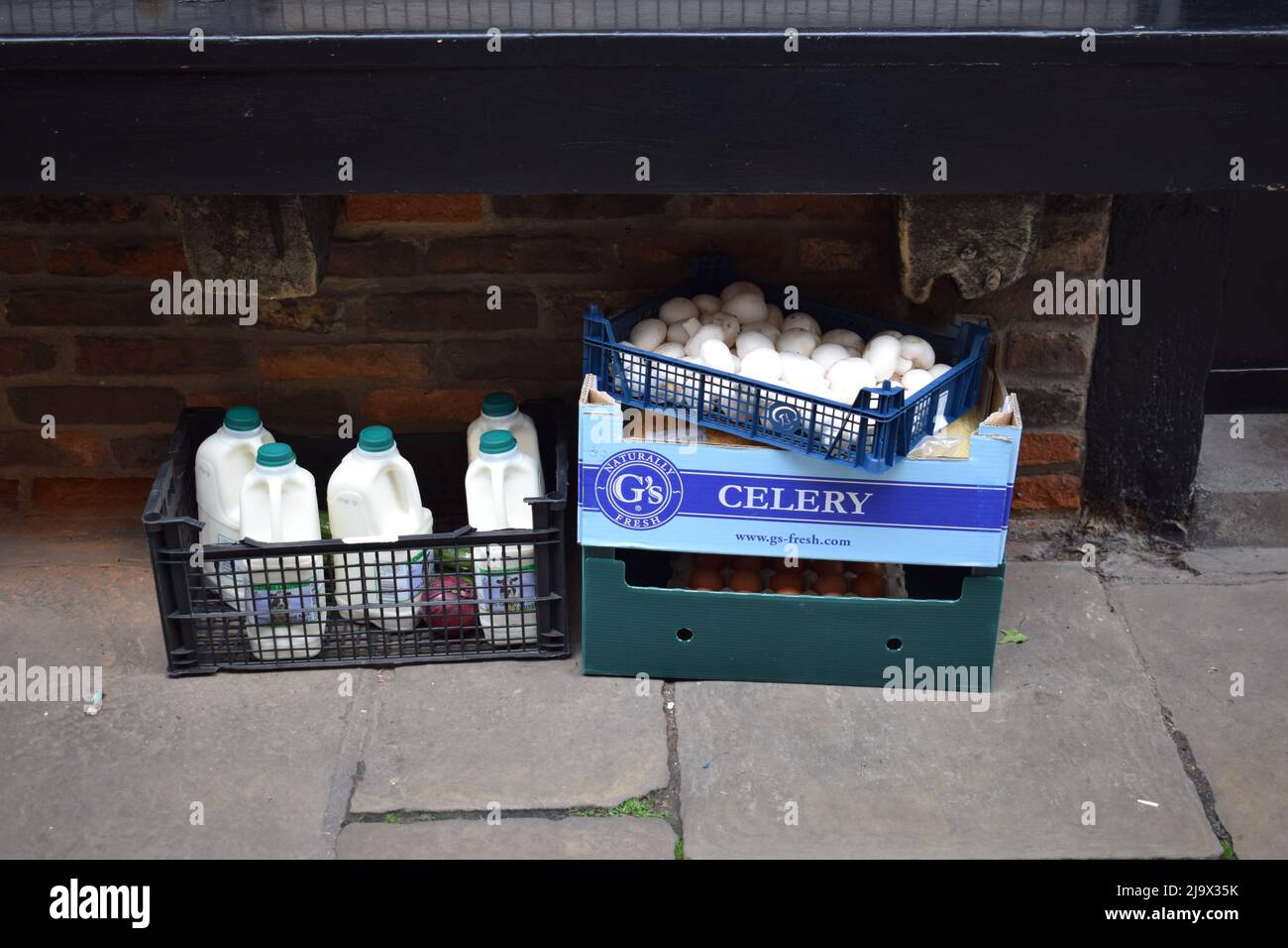 Fresh produce delivery storefront boxes shop Stock Photo Alamy