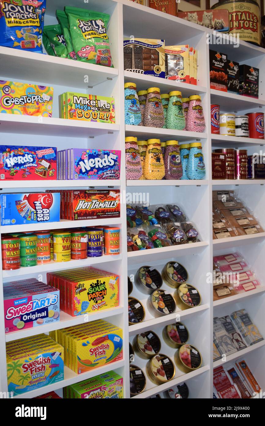 UK candy store shelves white clean sweets Stock Photo