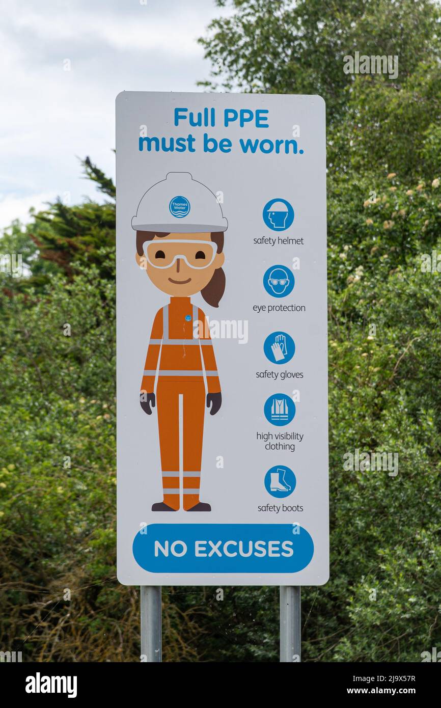 Notice at an industrial site (Thames Water) explaining site safety rules about personal protective equipment, UK Stock Photo