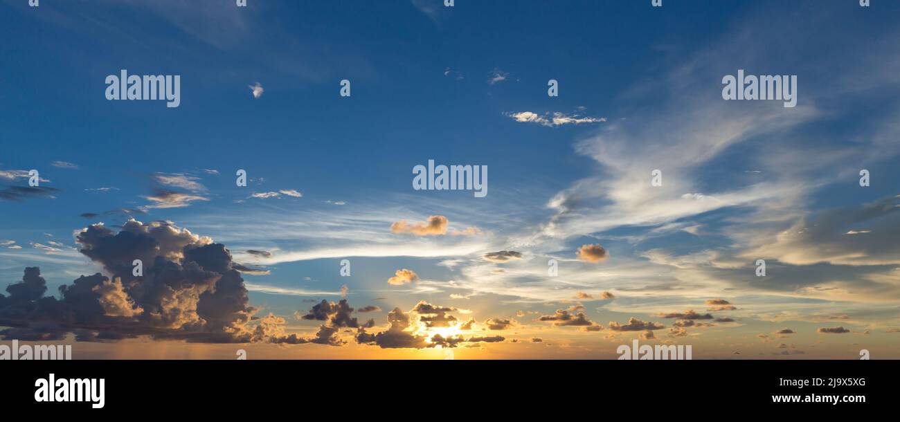 Evening sky with dramatic clouds over the sea. Dramatic sunset over the ...