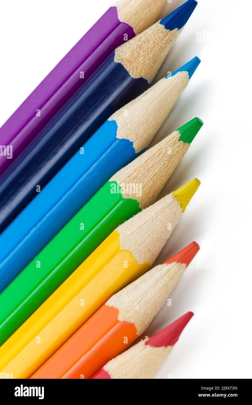 Many different colored pencils on white background. Stock Photo